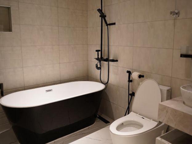 Lavenue Resthouse Appartement Nizwa Kamer foto