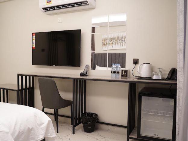 Lavenue Resthouse Appartement Nizwa Kamer foto