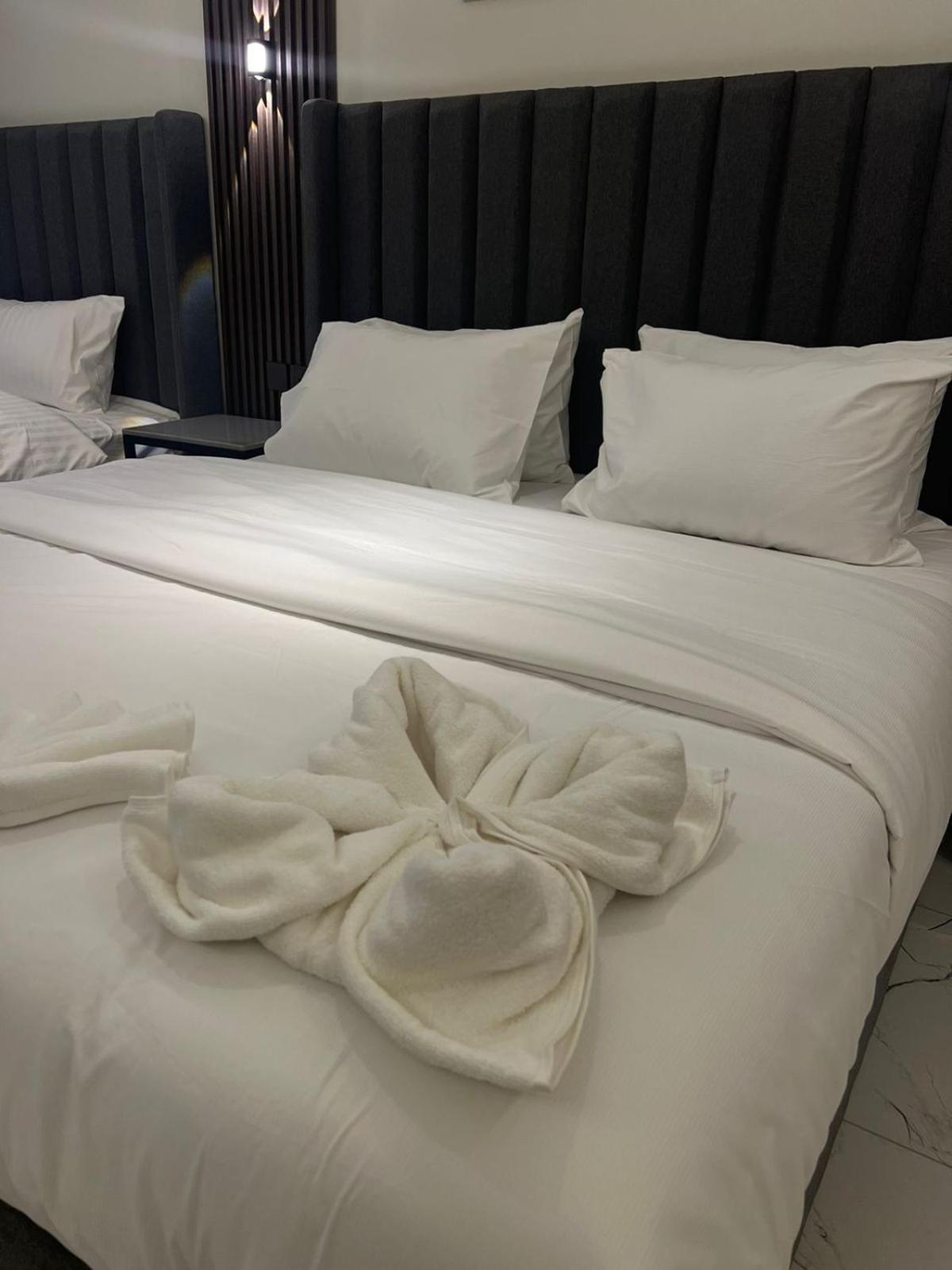 Lavenue Resthouse Appartement Nizwa Kamer foto
